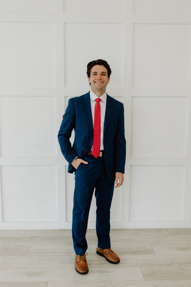 Full body image of a navy suit