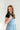 blue inch wide strap jumper with ankle length and form fitting bodice.