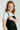 black inch wide strap jumper with ankle length and form fitting bodice.