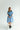 This dress features a tiered skirt, flowy sleeves, and pockets!