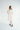 textured midi dress with round neck, pockets and puff sleeves