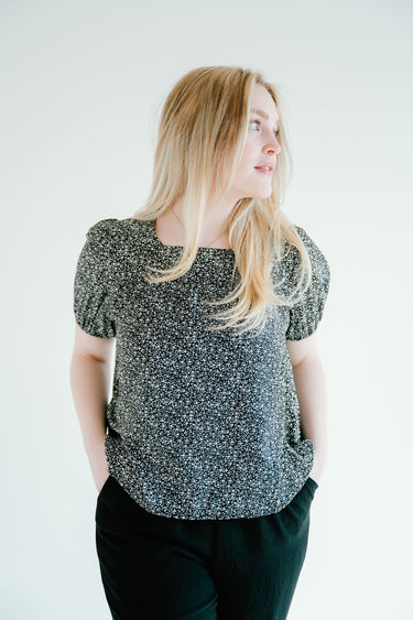 floral top with a soft square neckline, puff sleeves and flowy bodice