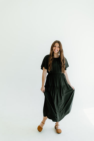 woman wearing a black dress