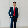 Full body image of a navy suit