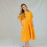This dress features a tiered skirt, flowy sleeves, and pockets! 