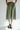 athletic material light olive green skirt with pockets and draw string waist