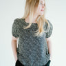 floral top with a soft square neckline, puff sleeves and flowy bodice