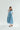 Modest sky blue dress with short sleeves and pockets.