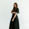 woman wearing a black dress